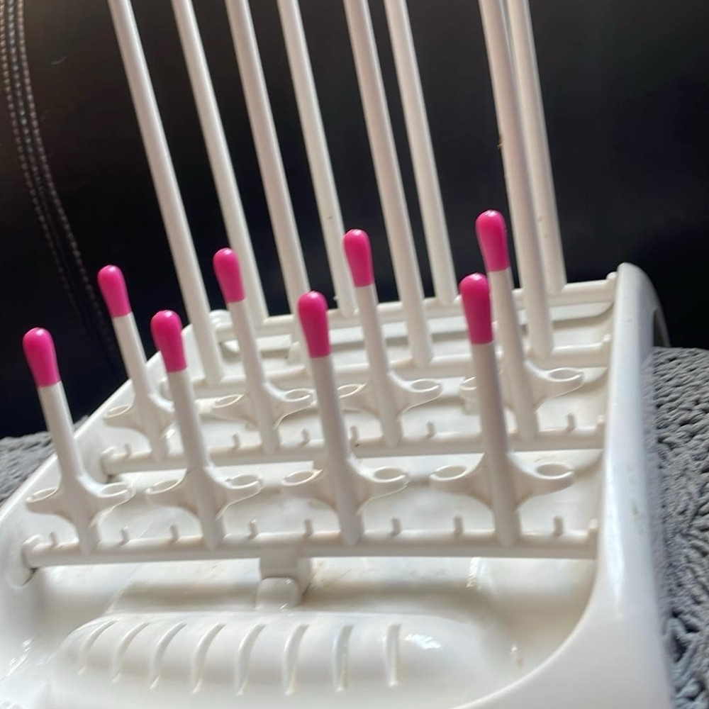 White and Pink Bottle Drying Rack